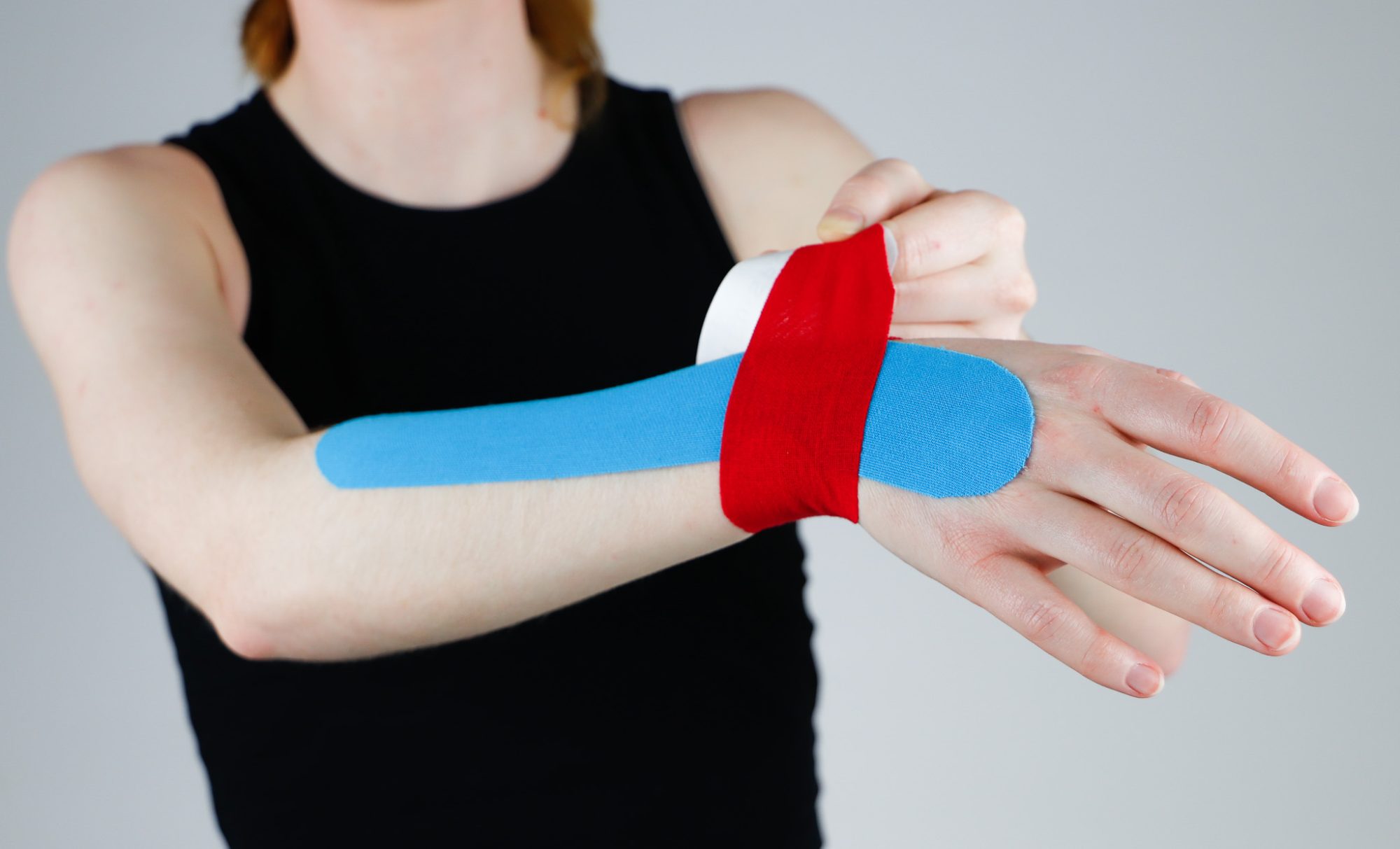 Pols tapen met kinesiotape stap 5
