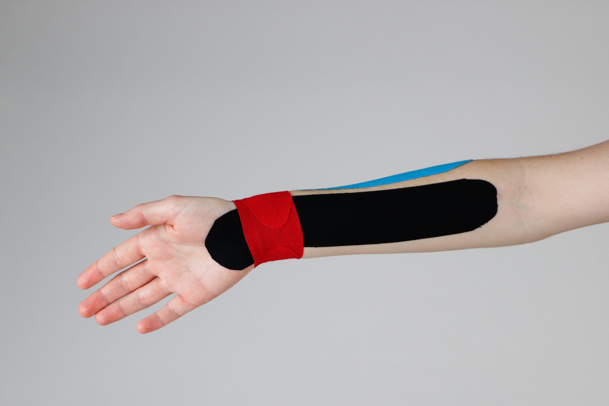 Pols tapen met kinesiotape stap 6