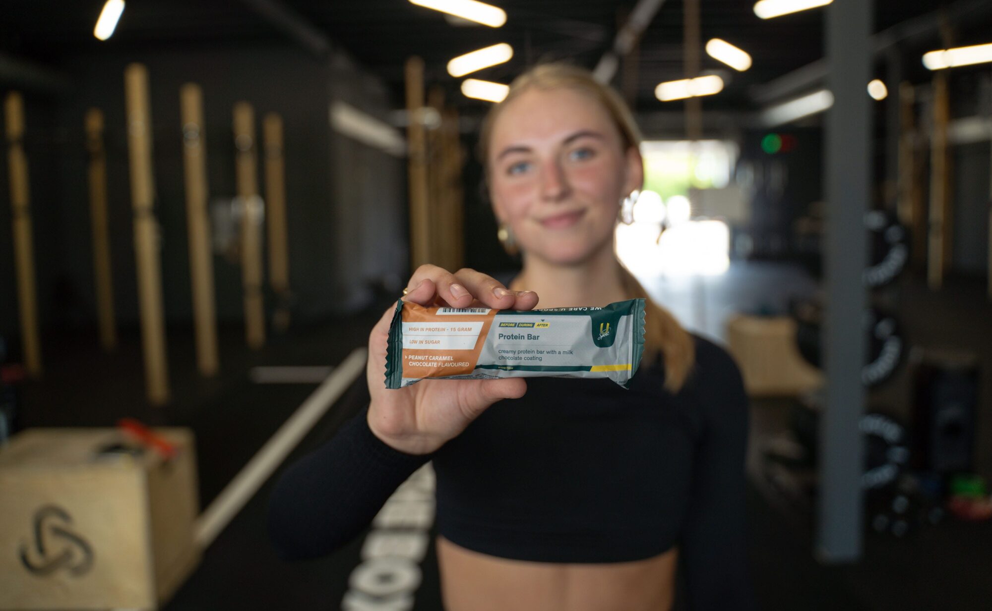 Protein bar eiwitreep sportschool dame U-Sport